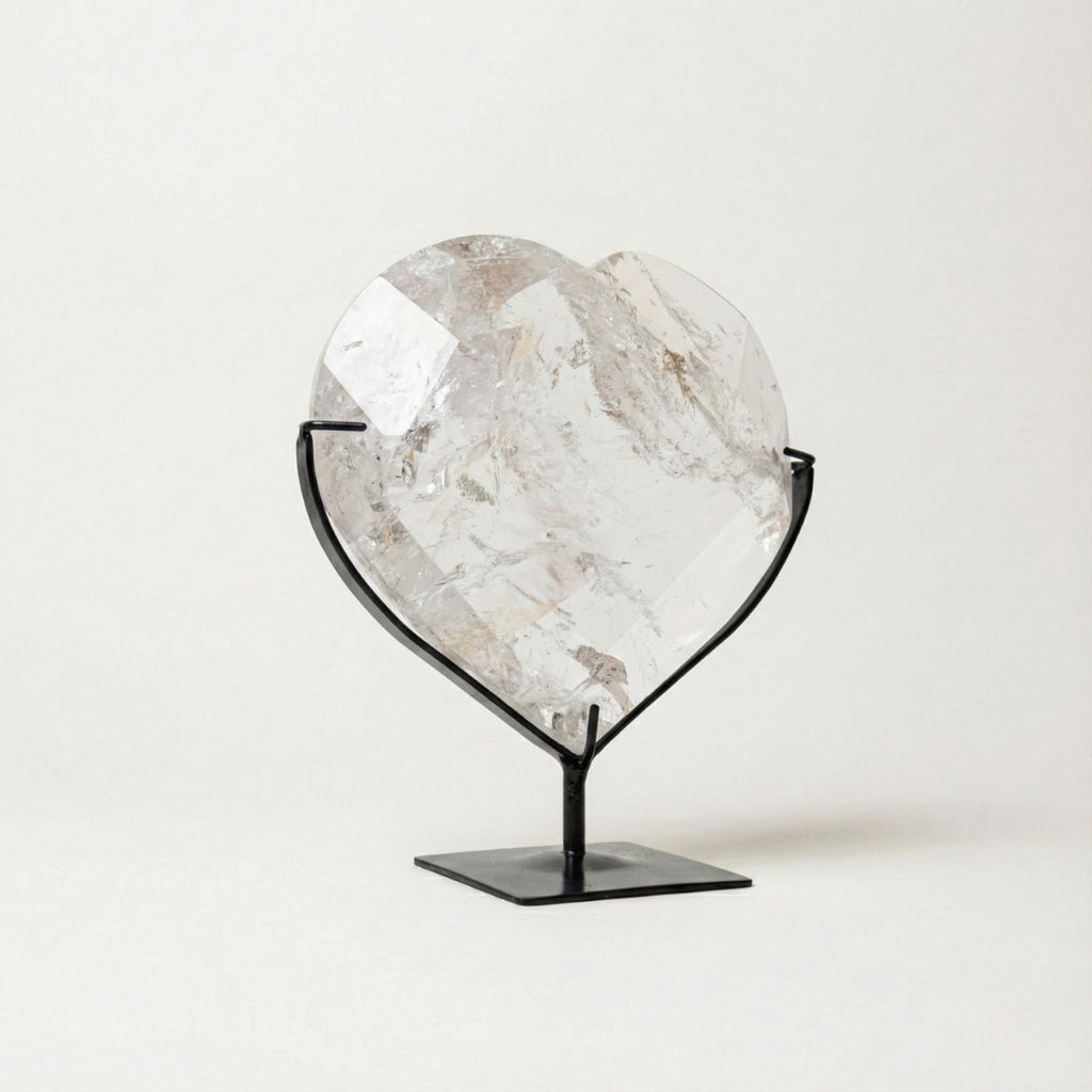 Hyaline Quartz Crystal Faceted Heart on Black Metal Base 1.679 kg