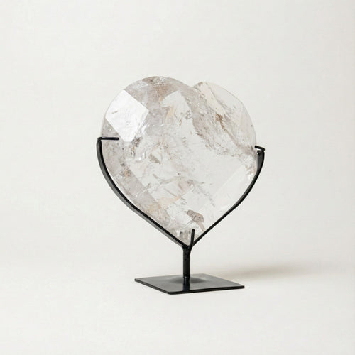 Hyaline Quartz Crystal Faceted Heart on Black Metal Base 1.679 kg
