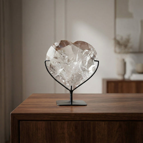 Hyaline Quartz Crystal Faceted Heart on Black Metal Base 820 grams