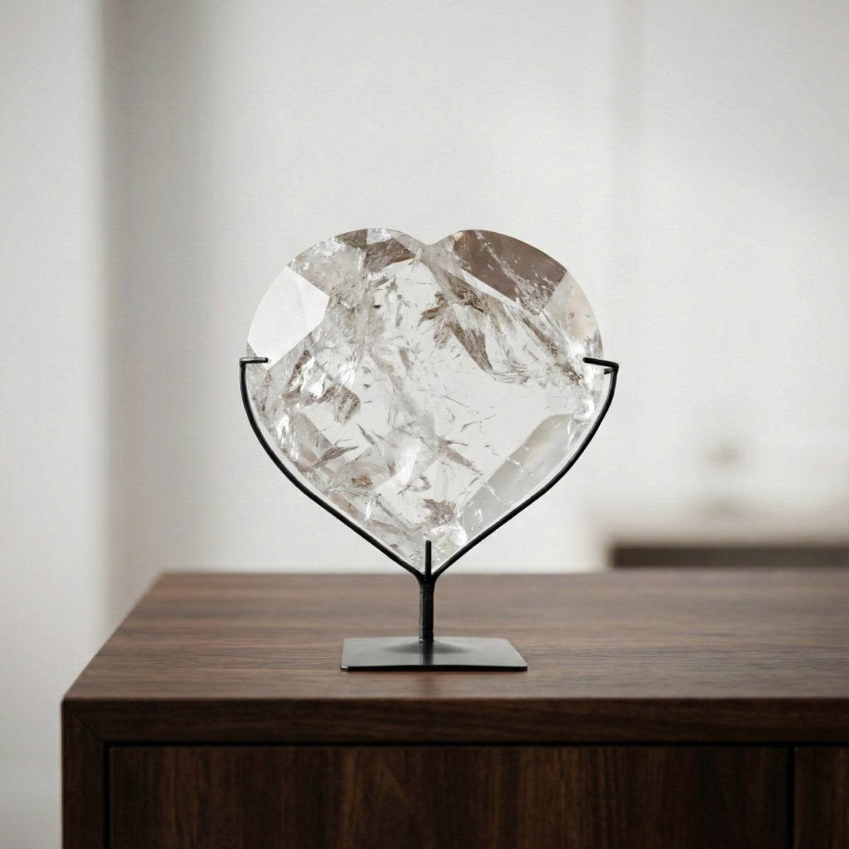 Hyaline Quartz Crystal Faceted Heart on Black Metal Base 1.679 kg