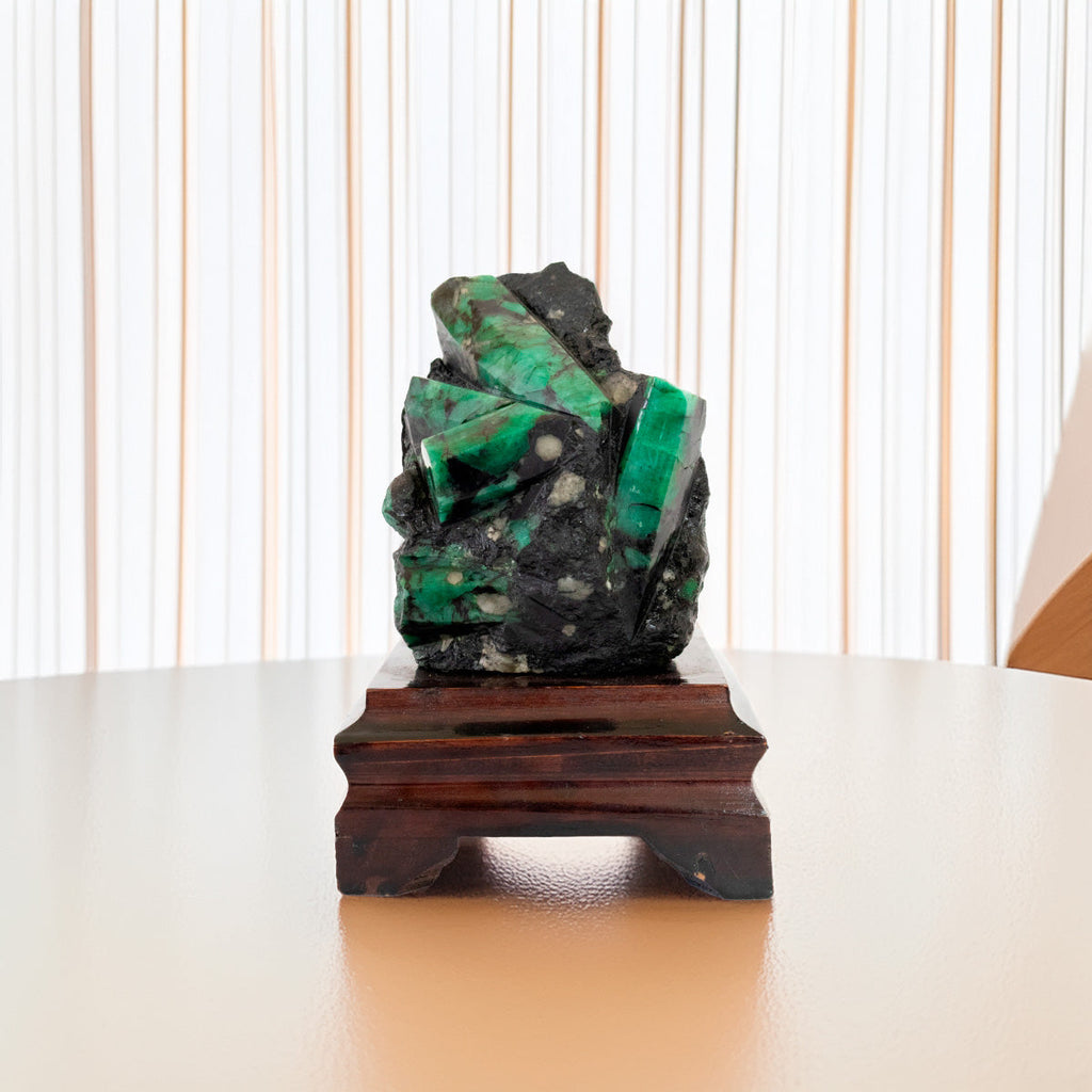 Extra Semi-Polished Emerald Stone in Matrix Wood Base 620 grams