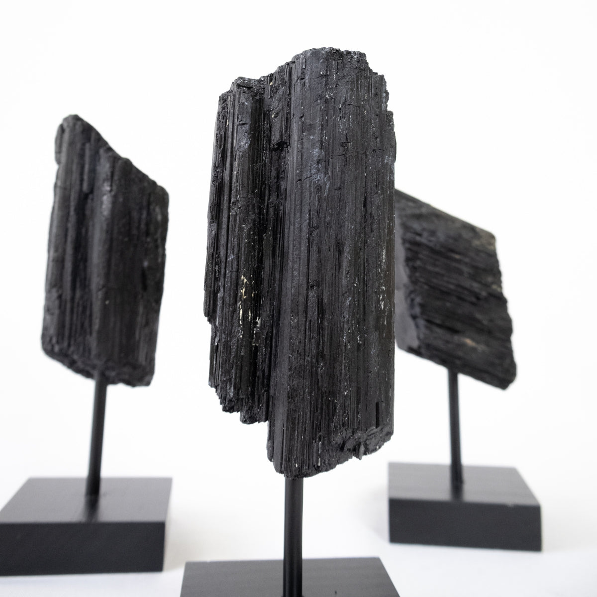 Raw Black Tourmaline on Black Wood Base 500 to 600 grams